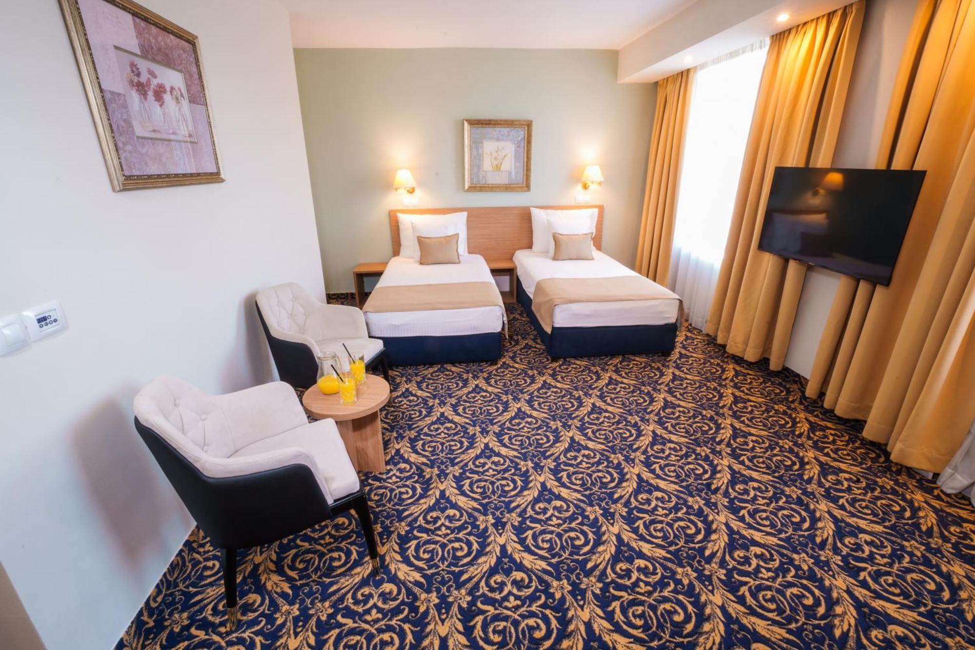 Hotel Monogram Park Ruma Ngoại thất bức ảnh